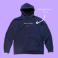Dunkelblauer Hoodie mit hellgelbem Print "Teilhabe statt Machtgehabe"